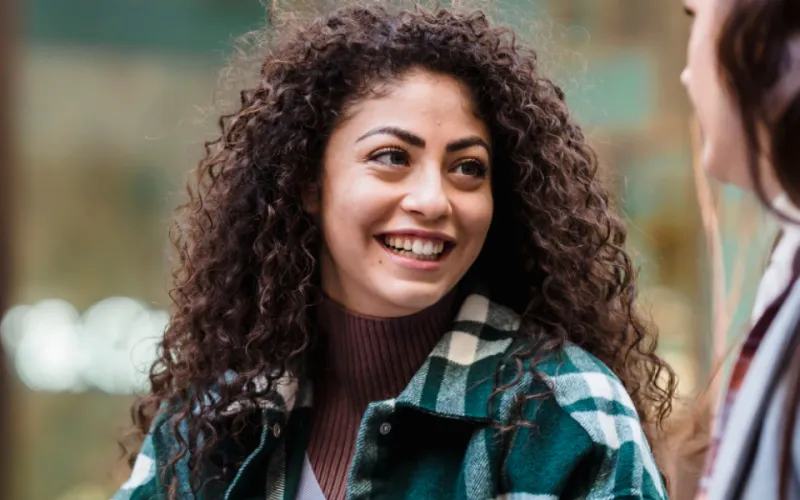 woman outside smiling