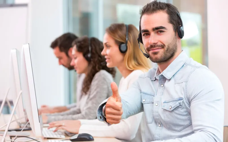 job centre worker thumbs up