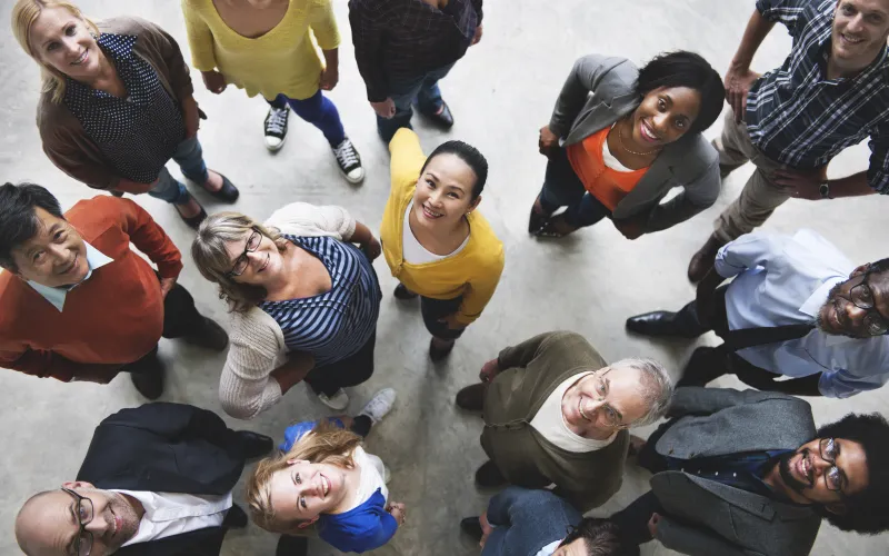 diverse group of people looking at camera