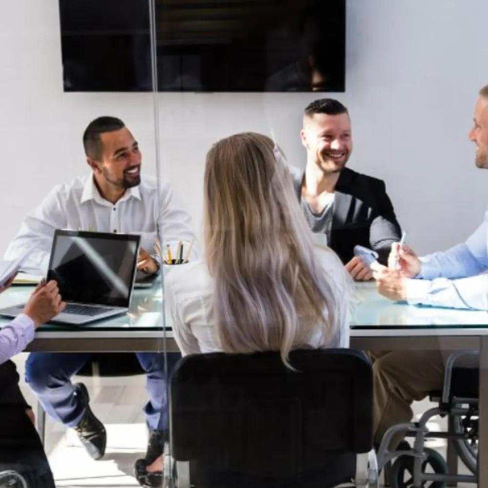 boardroom table with wheelchair user