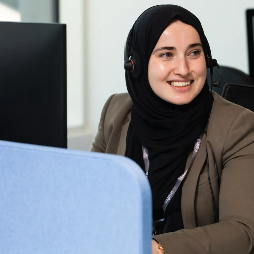 Smiling Call Centre Worker Wearing a Hijab